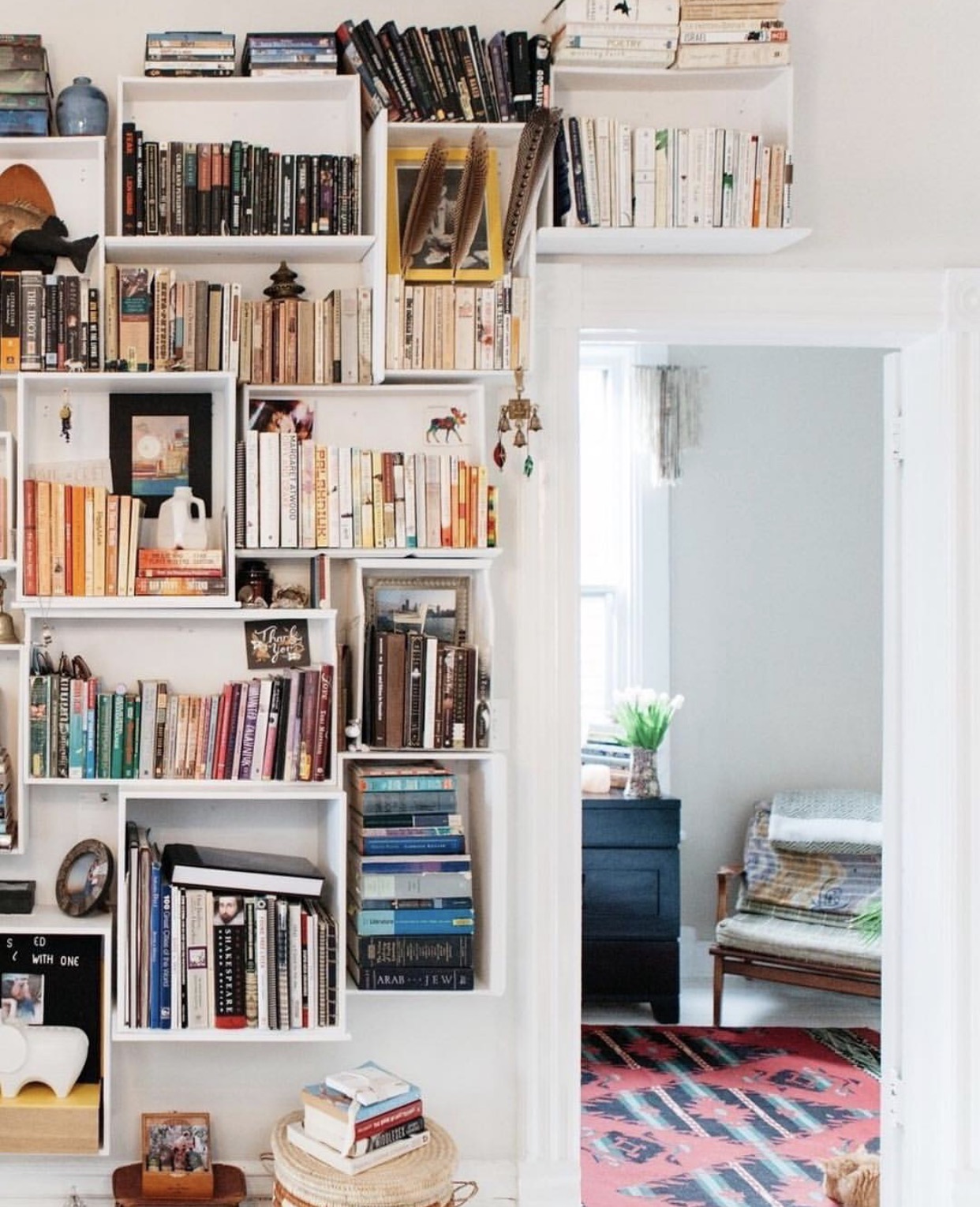 the bookcase under our stairs - Noelle's Favorite Things